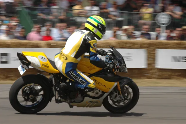 A motorcycle racer riding on a track